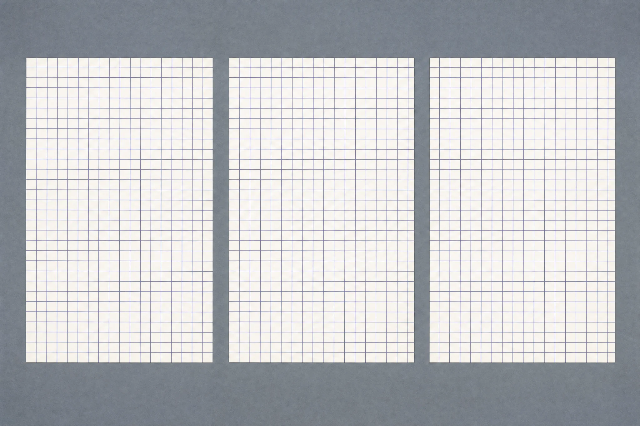 The Grid 3-Pack pattern laid flat: the same fine 4 mm square grid pattern design sheet shown three times identically in a row, presented as a restock set