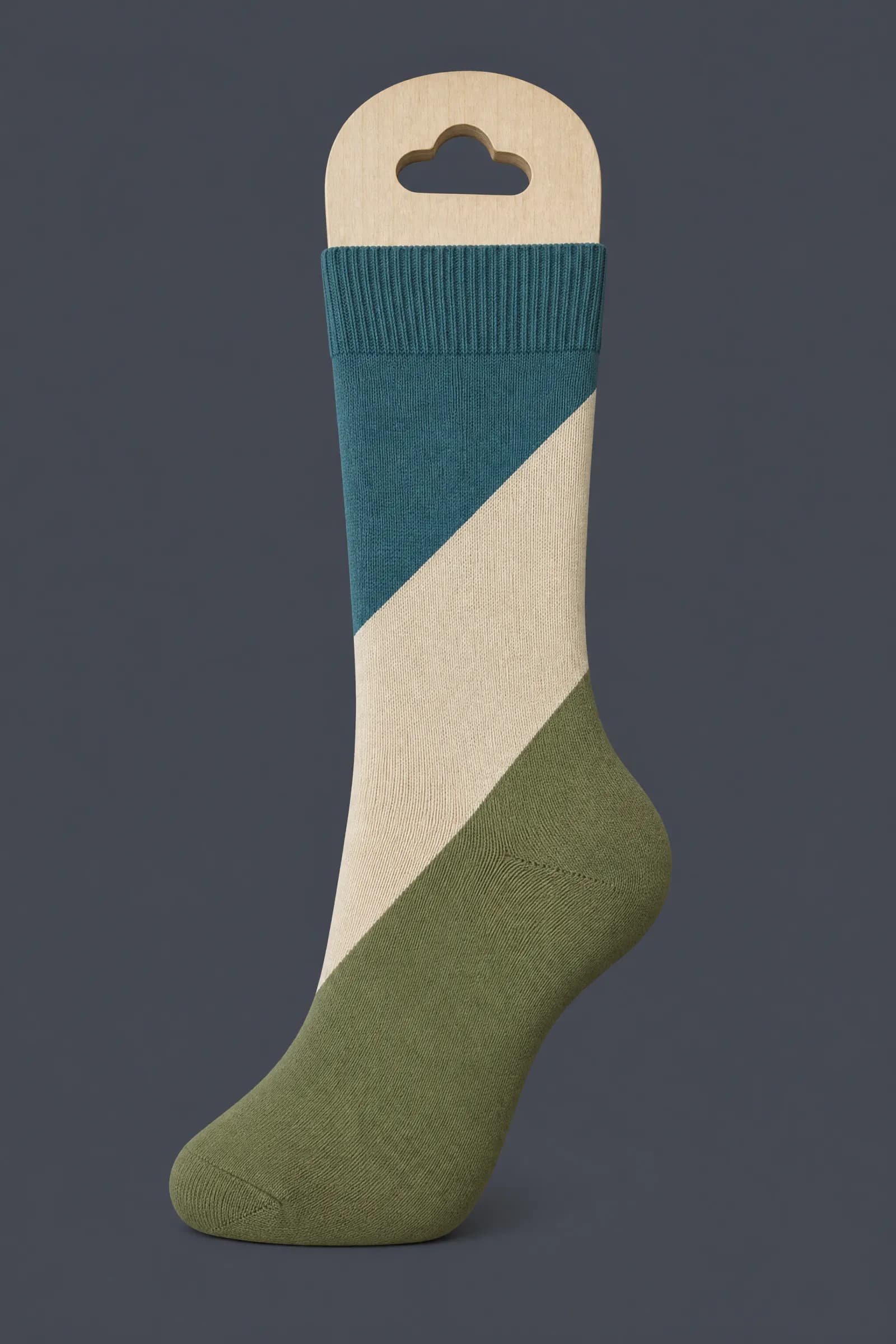 The Block Split pattern on a sock stretched over a sock form, showing how the drawing curves and compresses